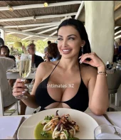 Amanda - A stunning NZ Girl with soft Black hair, combining allure with a powerful presence
